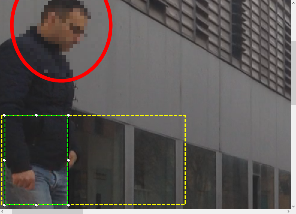 image of a guy walking with a red circle and a green and yellow rectangle displayed