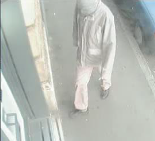 image of a suspect approaching an ATM